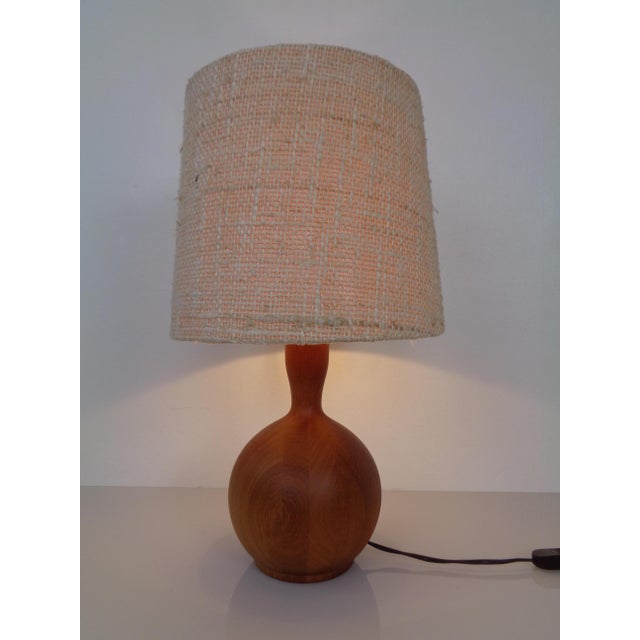 Table lamp made of solid teak by Domus. This piece has an attribution mark, I am sure that it is completely authentic and...