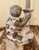 Gray porcelain monkey candle holder. Height: 8.5 inches Width: 7 inches Depth: 4.5 inches. Age: unknown Origin: unknown...
