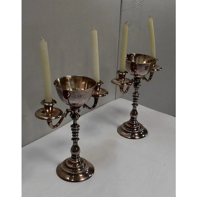 Set of two Calices Silver plated with light arms. Each of these consists of a Candlesticks Central Bowl, summoning a...