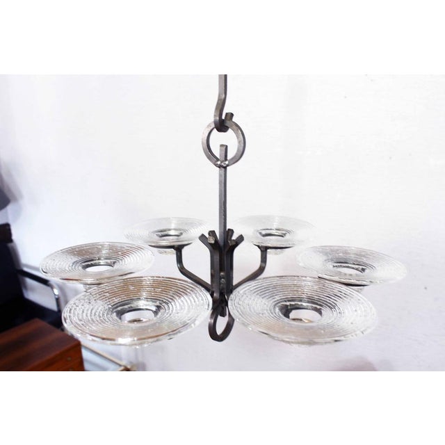 Superb iron and molded glass candlestick Art Deco. Imagined by Erik Höglund for Ystad-Metall This candlestick with a...