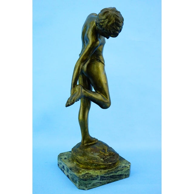 MEASUREMENTS: Height: 40 cm; Width: 21 cm; Depth: 16 cm; Weight: 4.443 kg Item : A magnificent gilded bronze sculpture...
