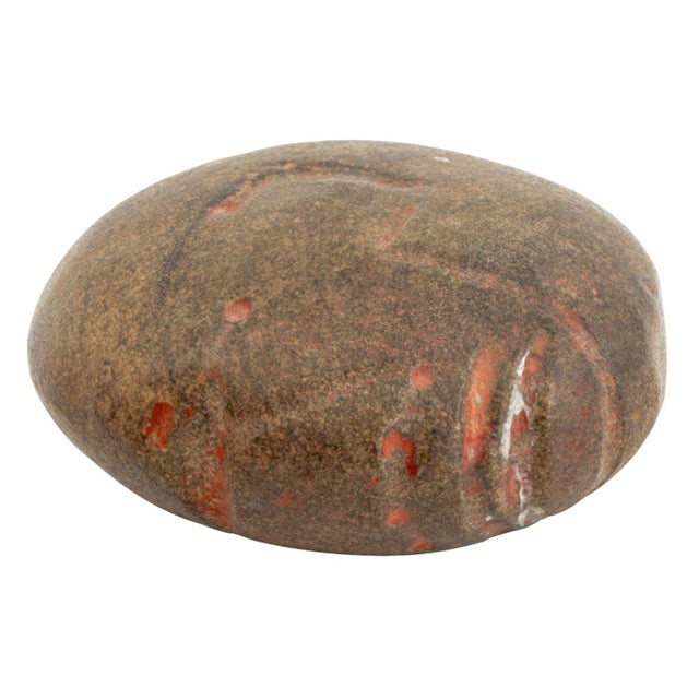 Mayan Human Head Carved Stone Celt, flat disc with male face, traces of red pigment. 1.25" H x 2.5" Diameter. Provenance:...