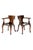A commanding pair of mahogany captains chairs or smokers bow armchairs with wide open arms. Each chair has a curved top...