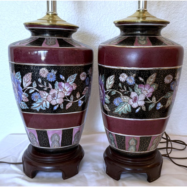 Vintage chinoiserie floral ginger jar style porcelain table lamps produced in the 1970s. Beautiful pink, blue and green...
