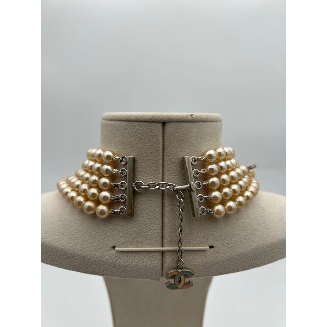 Chanel Multiple Layer Pearl Necklace. This beautiful Chanel necklace is a statement piece that can be worn several...