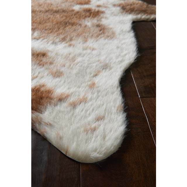 The Grand Canyon is a contemporary rug made in China from woven synthetics. The captivating look and colors are sure to...