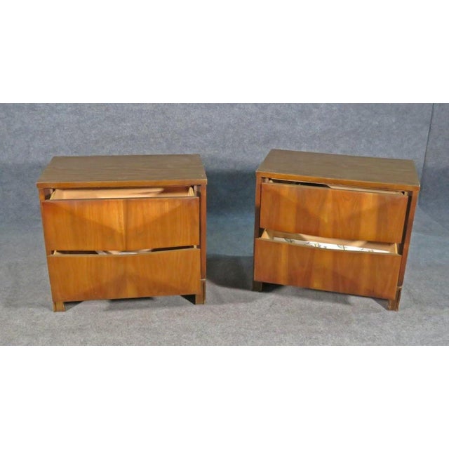 With an understated, simple design and a rich walnut woodgrain, this pair of diamond front night stands are styled after...
