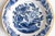 A gorgeous antique 18th-Century Dutch Delft faience floral plate. This lovely plate has a hand painted flower pot center...