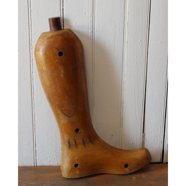 Beautifully crafted antique cobbler's boot form. Circa early-mid twentieth century. Solid and weighty, this is a beautiful...