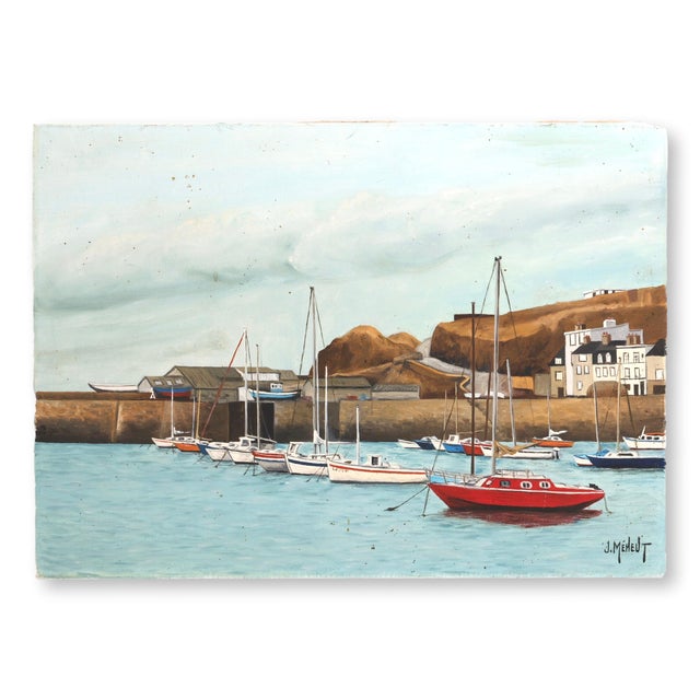 Mid 20th century French harbor scene oil on canvas depicting sailboats moored along a stone quay with coastal buildings...