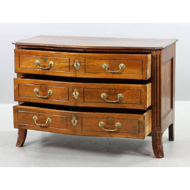 18th Century Northern Italian carved three-drawer commode. Serpentine front.