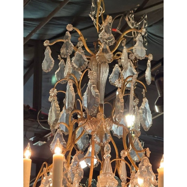 The 19th c. French Baccarat Manner Bronze and Crystal Chandelier is a stunning and elegant lighting fixture that would add...