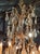 The 19th c. French Baccarat Manner Bronze and Crystal Chandelier is a stunning and elegant lighting fixture that would add...