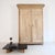 A large Belgian provincial hall cupboard or wardrobe from the first half of the 19th century. Solidly crafted from oak....