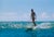 Hawaiian Scenes by Toni Frissell A surfer rides a wave, Hawaii, 1957. (Photo by Toni Frissell) 16x20" inches / 40x50cm...