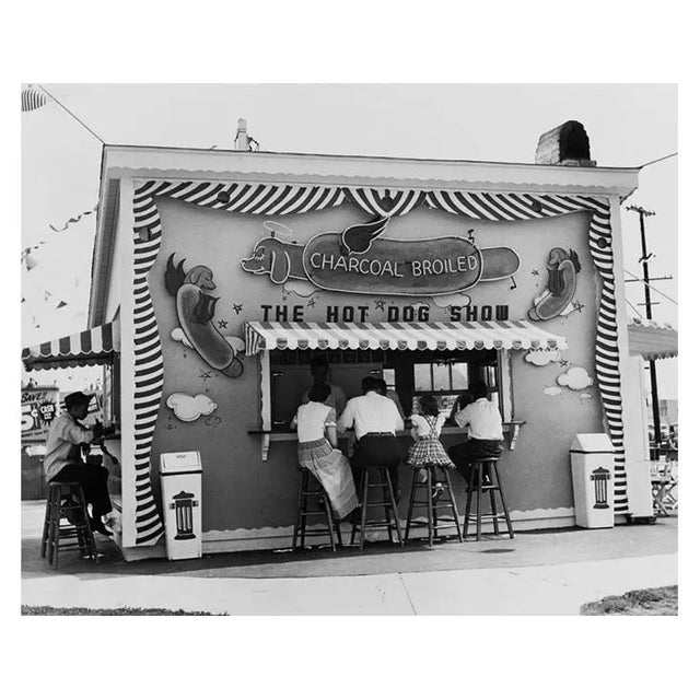 The Hot Dog Show The Hot Dog Show sells 'charcoal broiled' hot dogs to customers on La Cienega Boulevard in Los Angeles,...