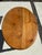 A charming late 19th-century American country pine oval side table featuring turned double-spindle legs, a matching turned...