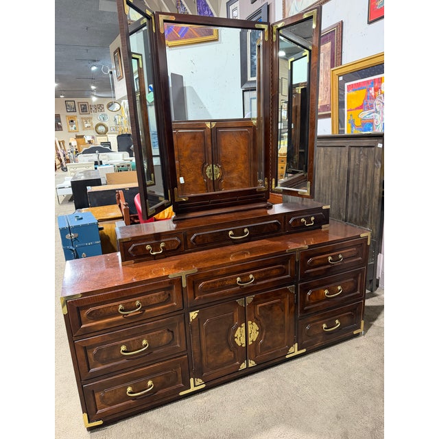 An exceptional blend of craftsmanship and timeless design, this Bernhardt dresser with matching tri-fold mirror showcases...