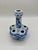 A distinctive 20th-century Chinese blue and white porcelain tulipiere or tulip vase, featuring a central raised spout...