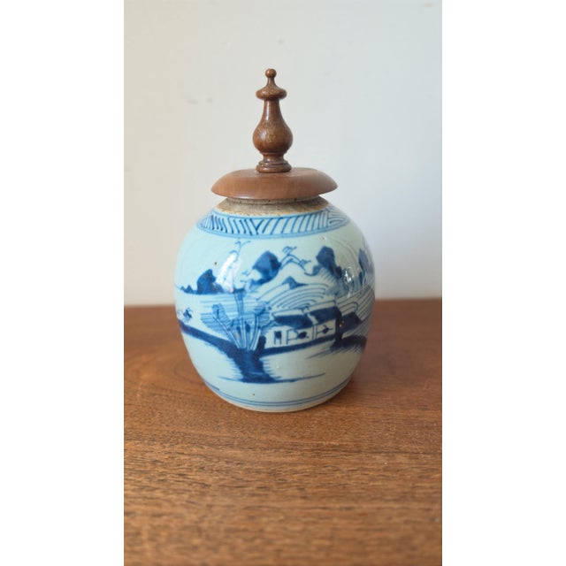 A beautiful 19th-century Qing Dynasty blue and white porcelain ginger jar, hand-painted with a traditional Chinese...