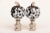 Pair of lamp finials crafted from speckled glass pumpkins mounted on knurled chrome finial bases sized to fit a standard-...