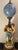 LARGE FLOOR STANDING FIGURAL LAMP , ITALY. Beautiful example of craftmanship. Measures 58" tall, globe is 12" in diameter...