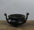 This is a reproduction of traditional Chinese iron incense or oil burner. It is hand forged with two handlers....