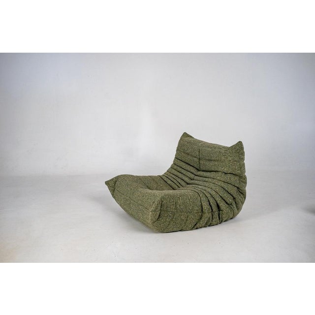 This Togo has been reupholstered with new foam and high-quality new fabric, keeping its inner structure, giving the item...