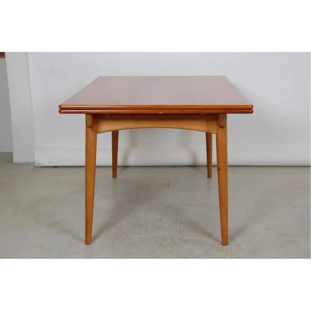 AT-316 Dining Table with Dutch Extensions in Teak and Oak by Hans Wegner for Andreas Tuck For Sale - Image 3 of 12