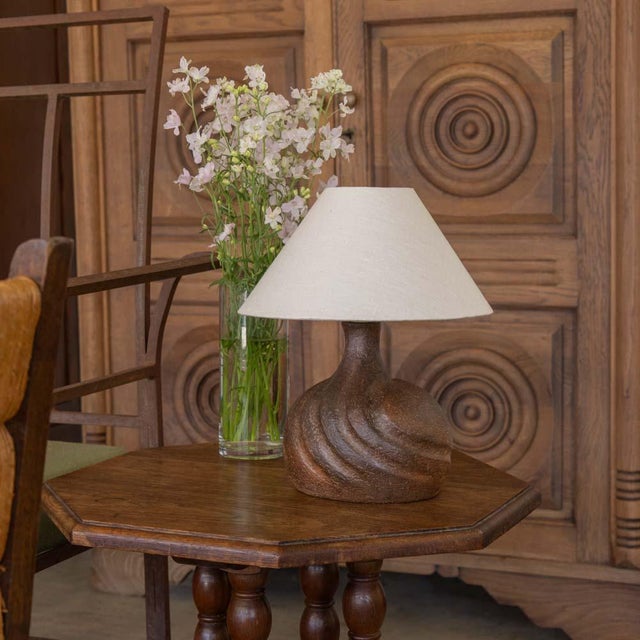 Beautiful vintage ceramic lamp from France, 1960s. Asymmetrical brown terracotta shape with ridges on surface. Newly...