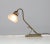 Stunning and rare Art Nouveau table lamp or desk lamp. Striking Dutch design from the 1900s. Patinated brass frame with...