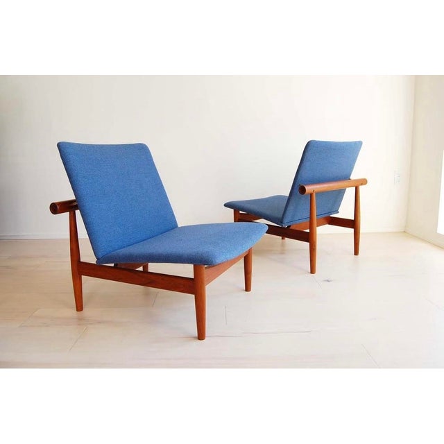 A stunning and rare matched pair of Finn Juhl FD137 “Japan Series” lounge chairs, designed in 1953 and manufactured by...