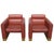 A pair of Karl Springer Style red faux leather club chairs. Featuring broad architectural arms, plush cylindrical back and...