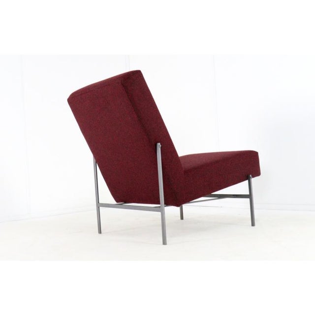 This mid-century modern armchair, type "Velp," is a refined example of timeless design, effortlessly combining comfort and...