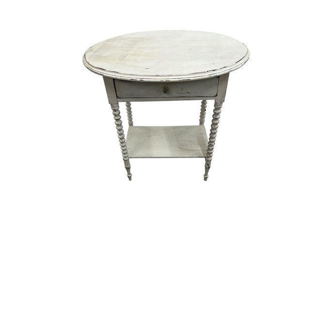 Antique distressed one drawer, two tier spool bobbin leg oval side or occasional table. Could be used as a small desk or...