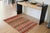 This stunning hand-knotted Afghan Balouchi rug is a captivating addition to any decor. Crafted by skilled artisans, it...