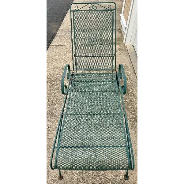 Nice iron adjustable reclining chaise lounge still in original factory green paint. The 2 wheels allow this piece to be...