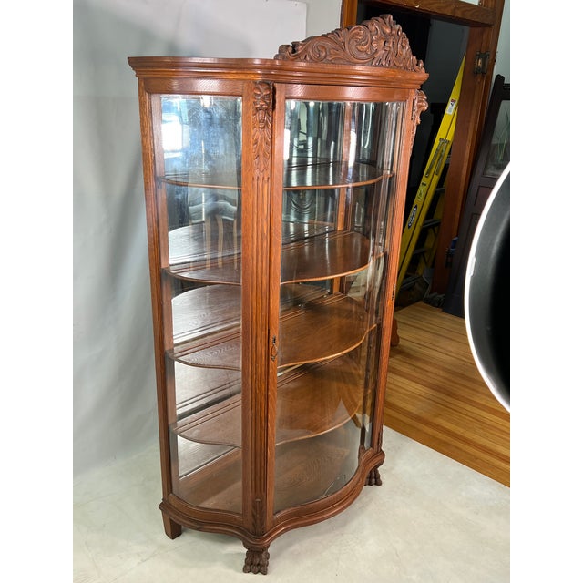 Antique Carved NorthWind Face Tiger Oak Bow Front China Chairish