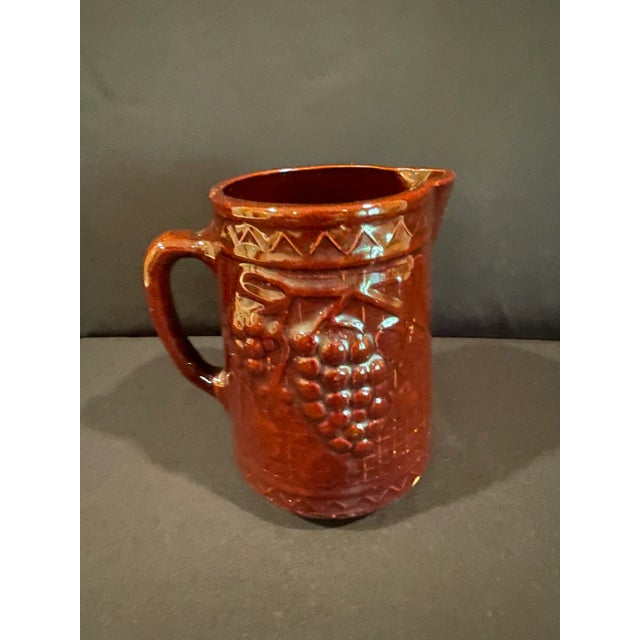 Farmhouse Early 20th Century Antique North Star Brown Salt Glazed Stoneware Pitcher With Grapes and Lattice Motif For Sale - Image 3 of 10