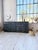 A vintage workshop cabinet with a thick beech top, oak drawer inserts, plywood sides, and pine trim, dating from the...
