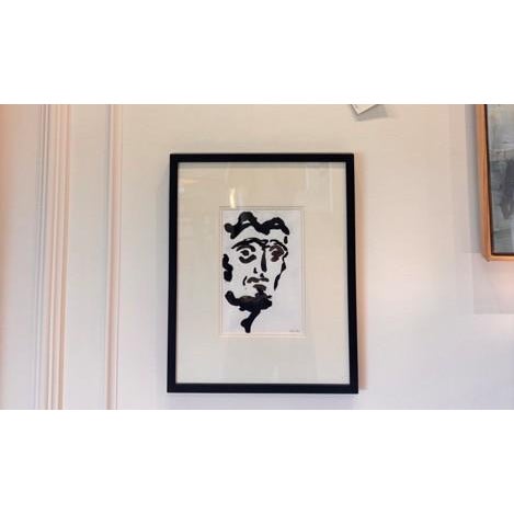 A striking pair of original figurative portrait studies by Thibon, executed in bold black ink with confident, gestural...