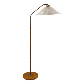 Swedish Modern Floor Lamp in Rattan and Brass, 1940s For Sale