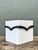 This vintage black and white stone box pairs a crisp geometric palette with richly tactile craftsmanship. Its wood body is...