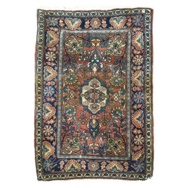 An early 20th-century high collectible Persian Sarouk Farahan rug with an ornate palette in earth tones Measures: 1'9'' x...