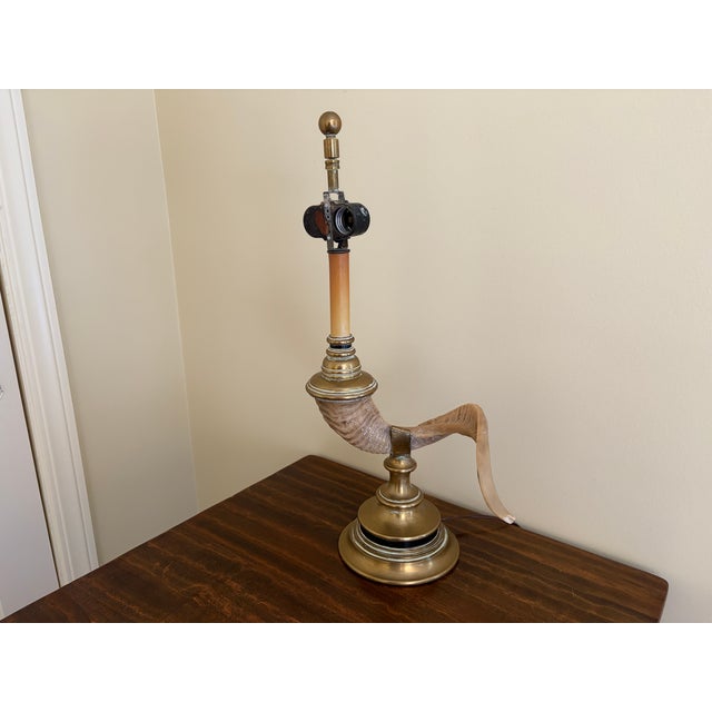 A wonderfully sculptural vintage table lamp dating to circa 1970, featuring a beautifully modeled faux ram’s horn...