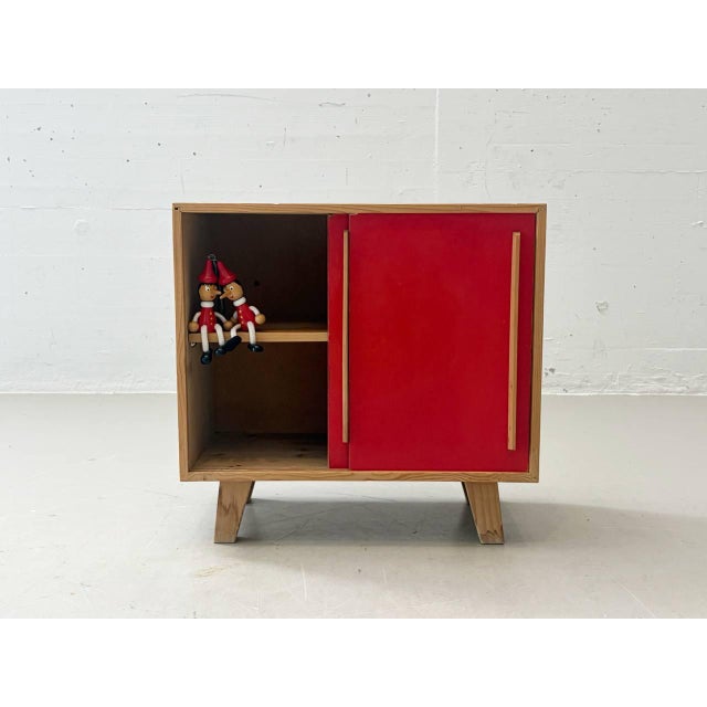 A characterful chest of drawers from stella möbel with a clean, almost playful design and striking color scheme. The...