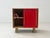 A characterful chest of drawers from stella möbel with a clean, almost playful design and striking color scheme. The...