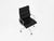 Black leather armchair with aluminum base and casters. Swivel. Dimensions: seat height 52 cm. Stamped "Ring Mobelfabrikk...