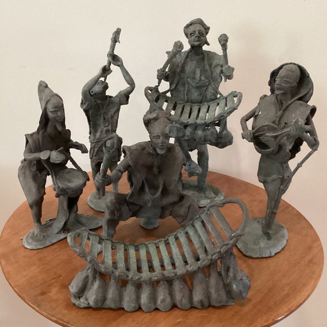 The Antique Ashanti Figural Bronze Musicians Sculptures are a set of 5 original handcrafted brass statues depicting...
