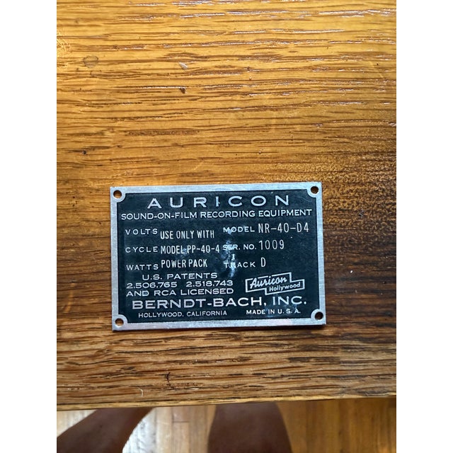 A rare mid-century industrial desk originally built for Auricon sound-on-film equipment, manufactured in Hollywood,...